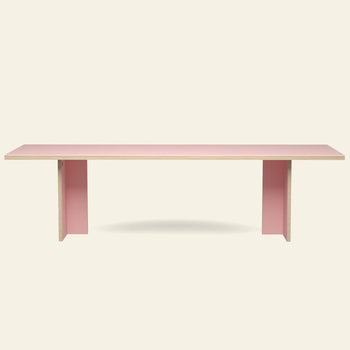 The HKLIVING Dining Table, Rectangular, 280cm features a minimalist light pink surface and matching panel legs—timeless HKLIVING design ideal for contemporary spaces, shown against a plain off-white background.
