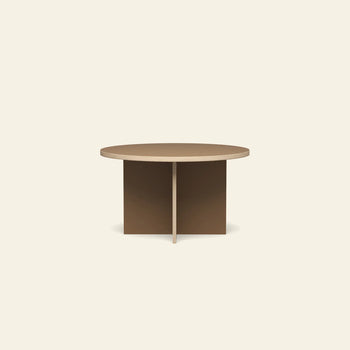 The HKLIVING Dining Table, Round, 130cm by HKLIVING features a thick circular top with intersecting flat panel legs, set against a light beige background—perfect for modern interiors.