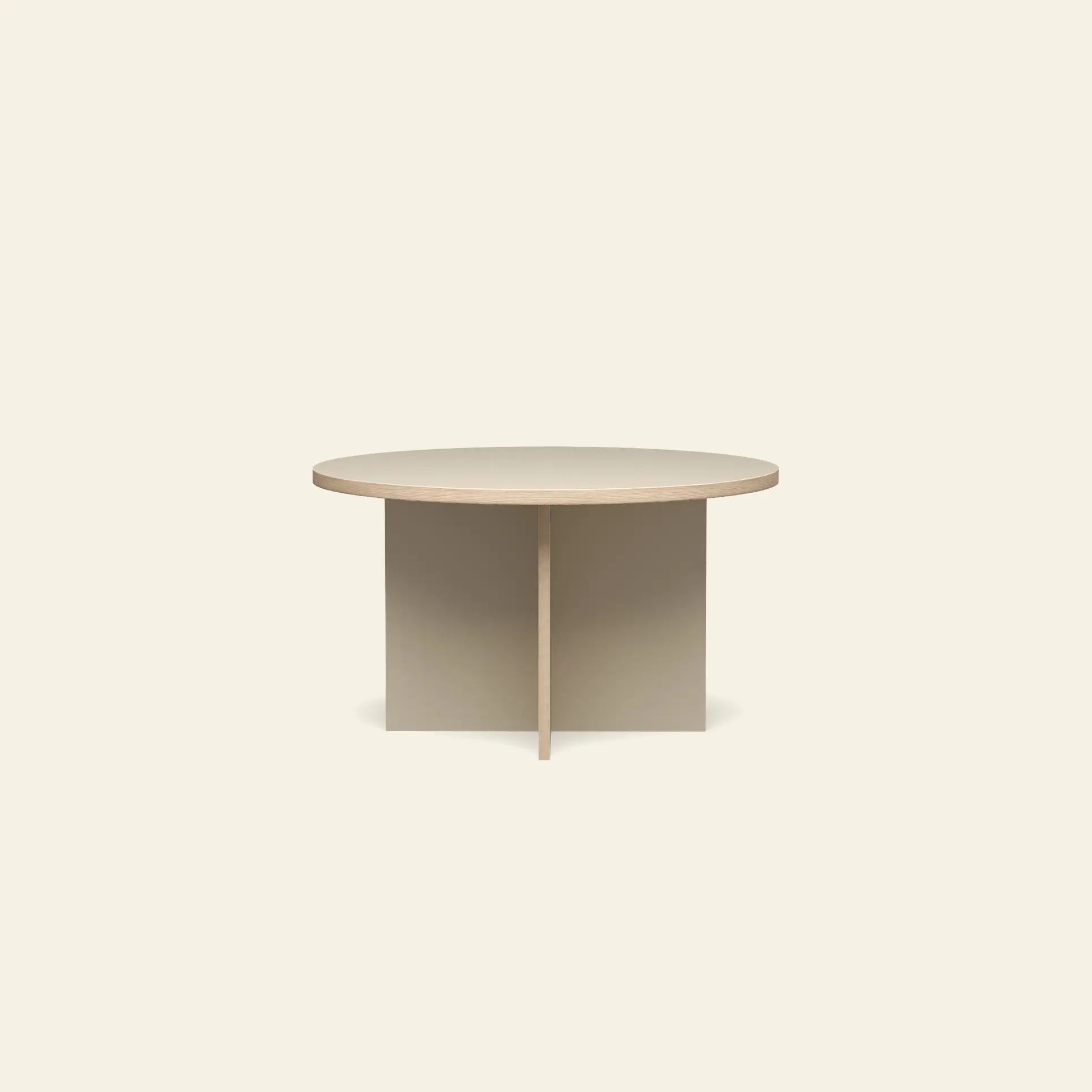 The HKLIVING Dining Table, Round, 130cm, features a minimalist light wood design with a simple cross-shaped base and is presented against an off-white background.