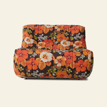 The HKLIVING Lazy Lounge Chair Outdoor by HKLIVING features a vibrant floral pattern with large orange, white, and green flowers on a dark background, making it a stylish and cozy choice for relaxing outdoors.