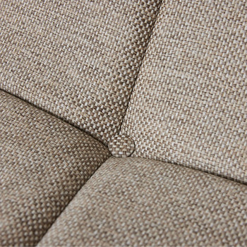 Close-up of the HKLIVING Lazy Lounge Chair Outdoor shows its beige woven fabric cushion, intersecting seams meeting at a central button, and detailed upholstery stitching that highlights HKLIVING's craftsmanship.