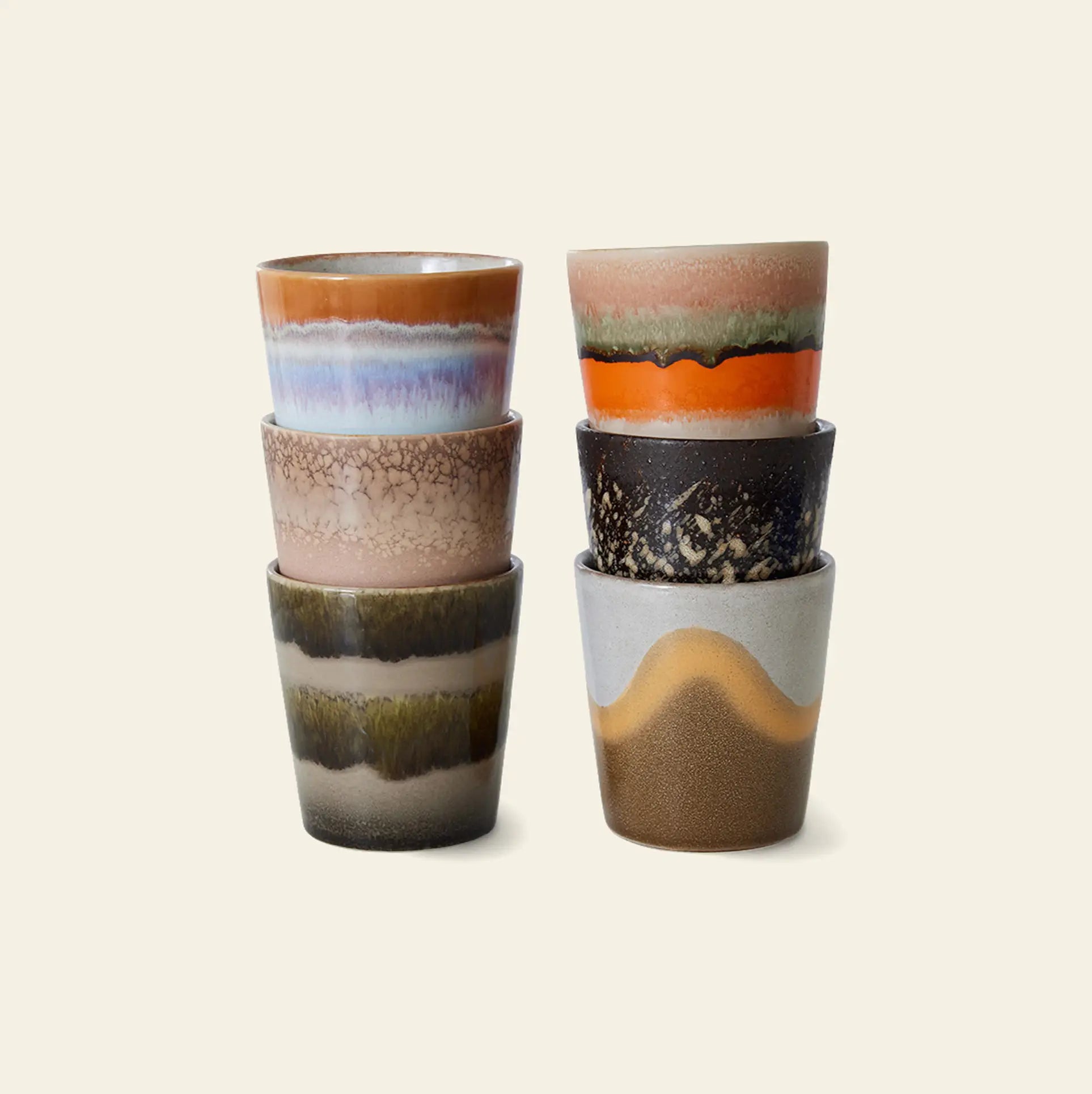 The HKLIVING 70s Ceramics Coffee Mugs Set of 6 features uniquely handcrafted glazed mugs with colorful, textured patterns, stacked in two columns of three against a light background. Each cup reflects the signature HKLIVING vintage style.