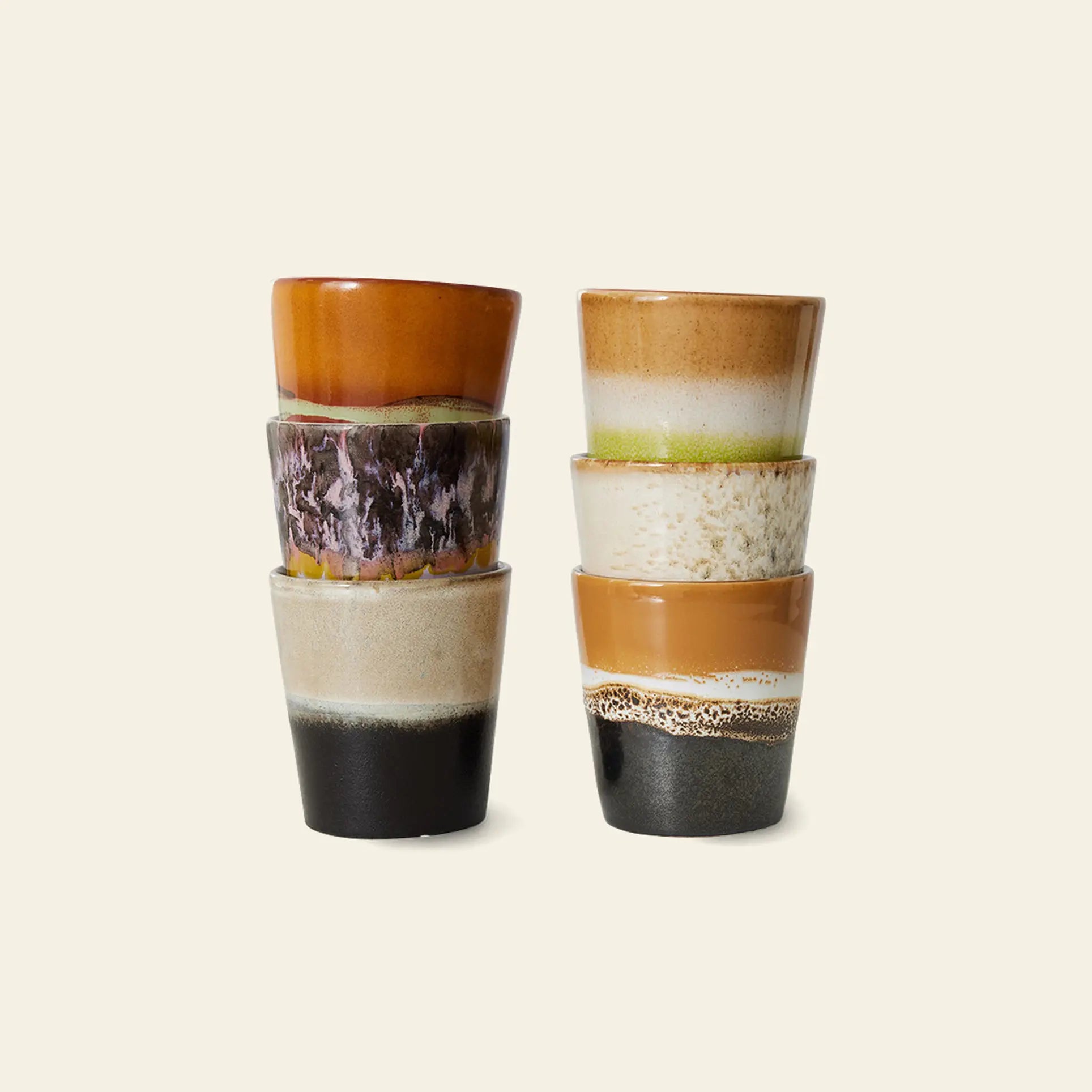 A set of six HKLIVING 70s Ceramics coffee mugs, each with unique hand-glazed multicolored and earth-toned gradients, brings retro charm to any setting against a simple light background.