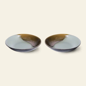 The HKliving 70s Ceramics: Curry Bowls, Set of 2, feature a glossy gradient in earthy green, brown, and gray, evoking vintage charm. Shown side by side on a plain light background.