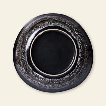 The HKliving 70s Ceramics: Curry Bowls (Set of 2) feature glossy black centers and speckled gray rims, inspired by vintage ceramics—perfect for adding a retro touch to your table.