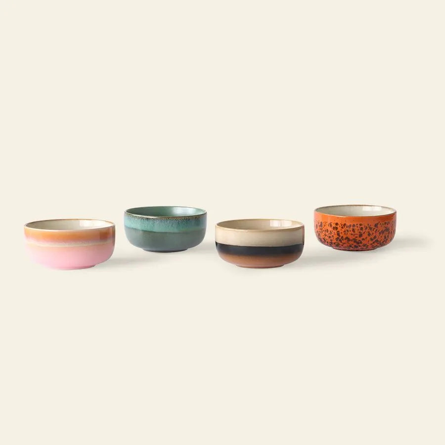 The HKLIVING 70s Ceramics Dessert Bowls Set of 4 features retro-inspired bowls in pink, teal, brown with beige, and orange with speckles, each showcasing unique colors and patterns.