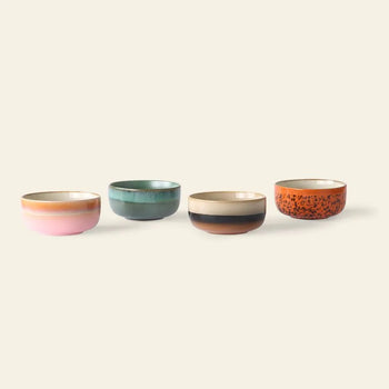 The HKLIVING 70s Ceramics Dessert Bowls Set of 4 features retro-inspired bowls in pink, teal, brown with beige, and orange with speckles, each showcasing unique colors and patterns.