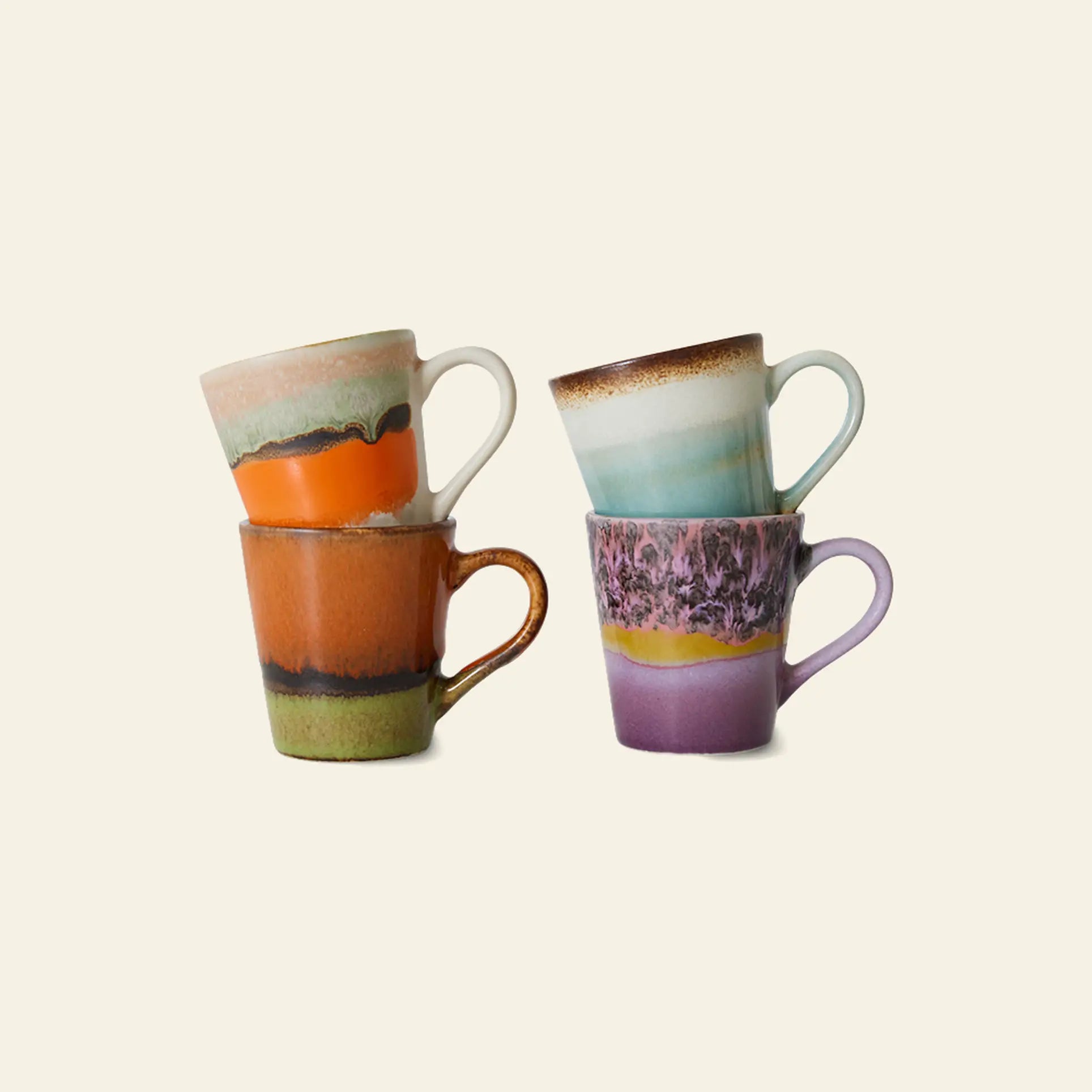 The HKLIVING 70s Ceramics: Espresso Mugs, Set of 4 features colorful, hand-painted mugs with unique multicolored designs and earthy tones, stacked in pairs against a plain background—classic style from the HKLIVING brand.