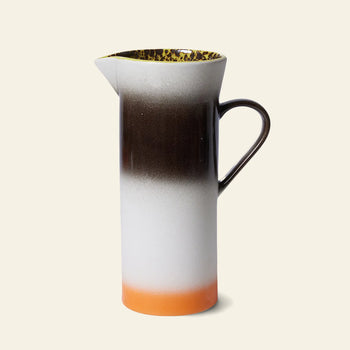 The HKLIVING 70s Ceramics: Jug - Bomb is a tall ceramic pitcher with a narrow spout, handle, and an orange-to-brown gradient plus speckled rim—ideal as a modern accent inspired by retro 70s design.