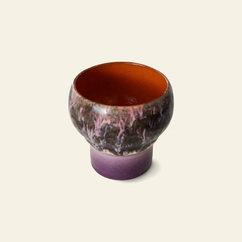 The HKLIVING 70s Ceramics: Lungo Mugs, Set of 2 features retro-inspired mugs with round bowls, glazed in earthy purple and brown hues outside and a vibrant reddish-orange interior, shown on a light beige background.