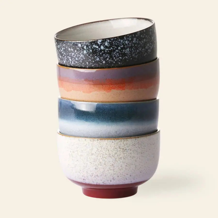 The HKLIVING 70s Ceramics: Noodle Bowls, Set of 4 features stoneware bowls in speckled black, reddish-brown, blue, and off-white glazes—bringing retro style to your table and making each meal unique against a simple light background.