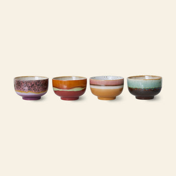 The HKLIVING 70s Ceramics: Noodle Bowls, Set of 4 features unique, colorful glazes in vibrant purple, orange, pink, green, and brown—each bowl showcasing a distinct retro-inspired design.