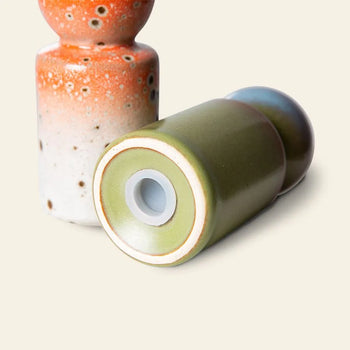 The HKLIVING 70s Ceramics: Pepper & Salt Jar features two grinders—one upright with an orange and white glaze, the other lying down in green and blue, showing its grinder. These retro jars showcase HKLIVING’s signature 70s ceramic style.