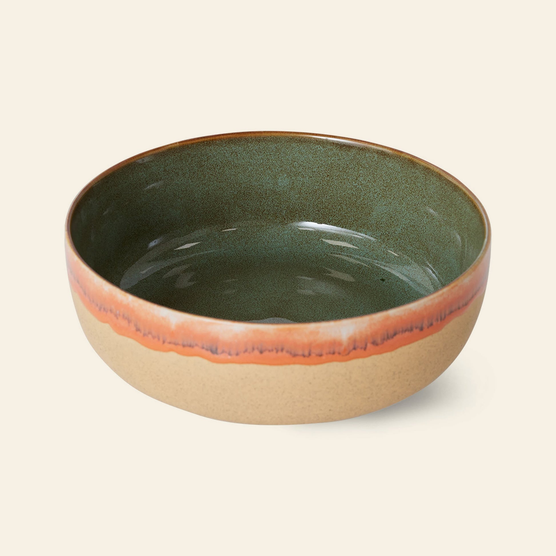 The HKLIVING 70s Ceramics: Salad Bowl by HKLIVING features a matte tan exterior, glossy green interior, and rust-colored rim, capturing retro charm against a plain light background.