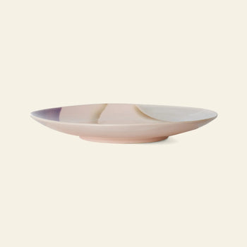The HKLIVING 70s Ceramics: Side Plates, Set of 2 features shallow, round ceramic plates with a pink, cream, and lavender pastel gradient finish, capturing vintage 70s charm against a plain beige background.