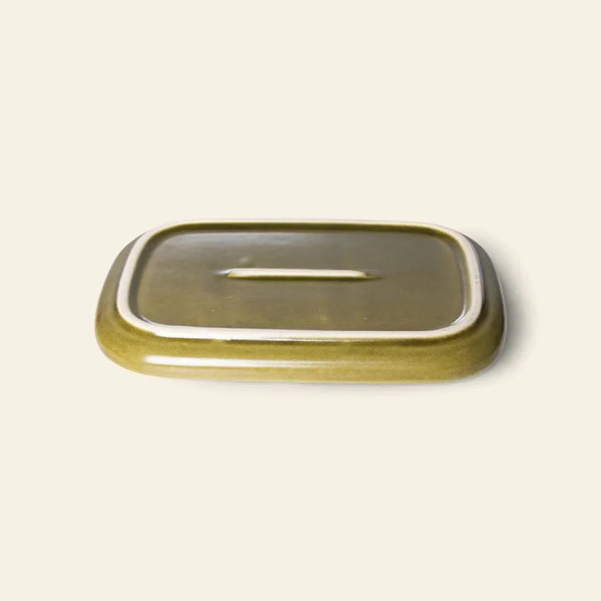 The HKLIVING 70s Ceramics: Small Trays, Set of 2 - Atlas features rectangular, olive-green ceramic lids with small central handles and white borders, evoking retro style, shown on a light beige background.