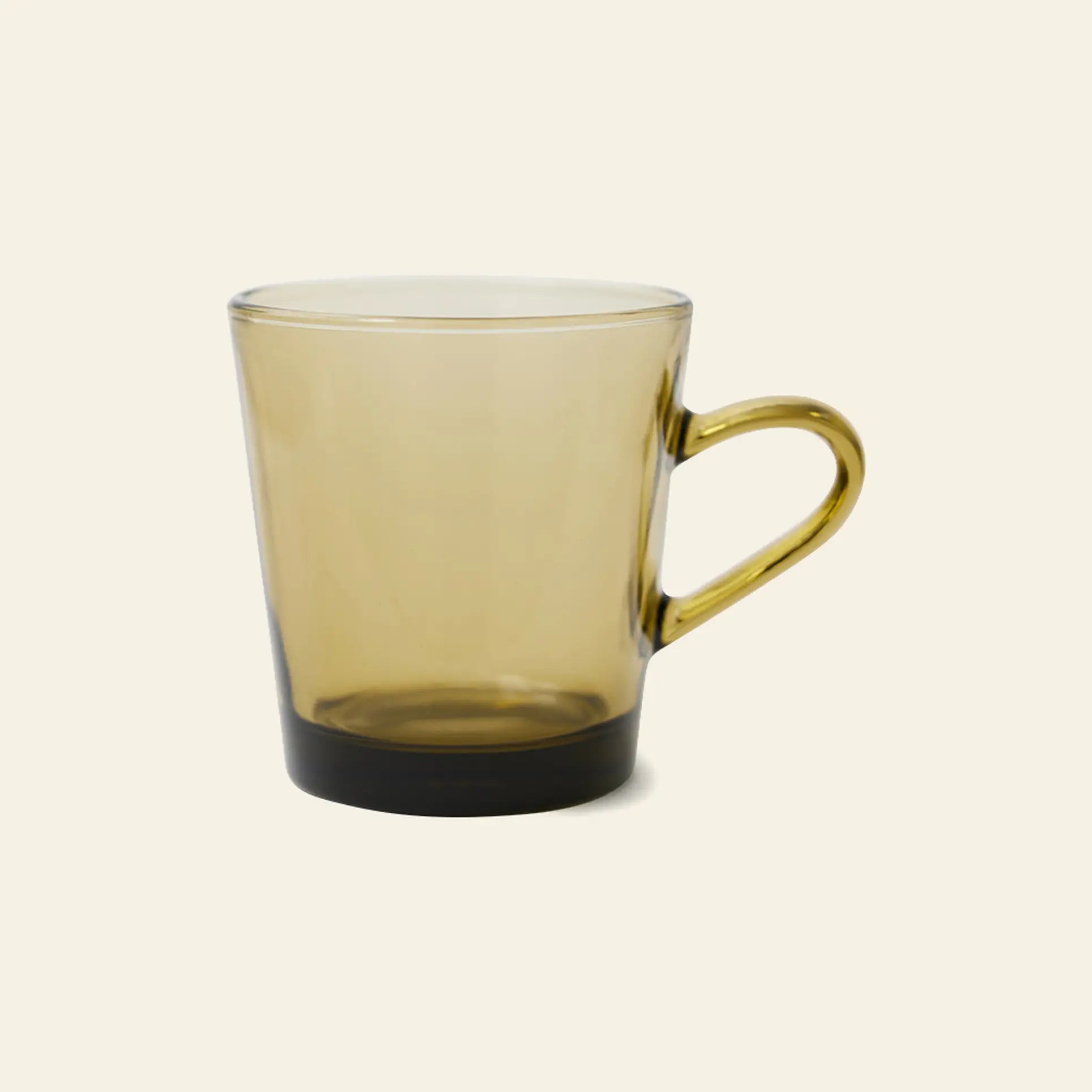 The HKLIVING 70s Glassware Coffee Cups, Set of 4, feature translucent light brown glass with handles, evoking retro 70s style, and are shown against a plain light beige background.