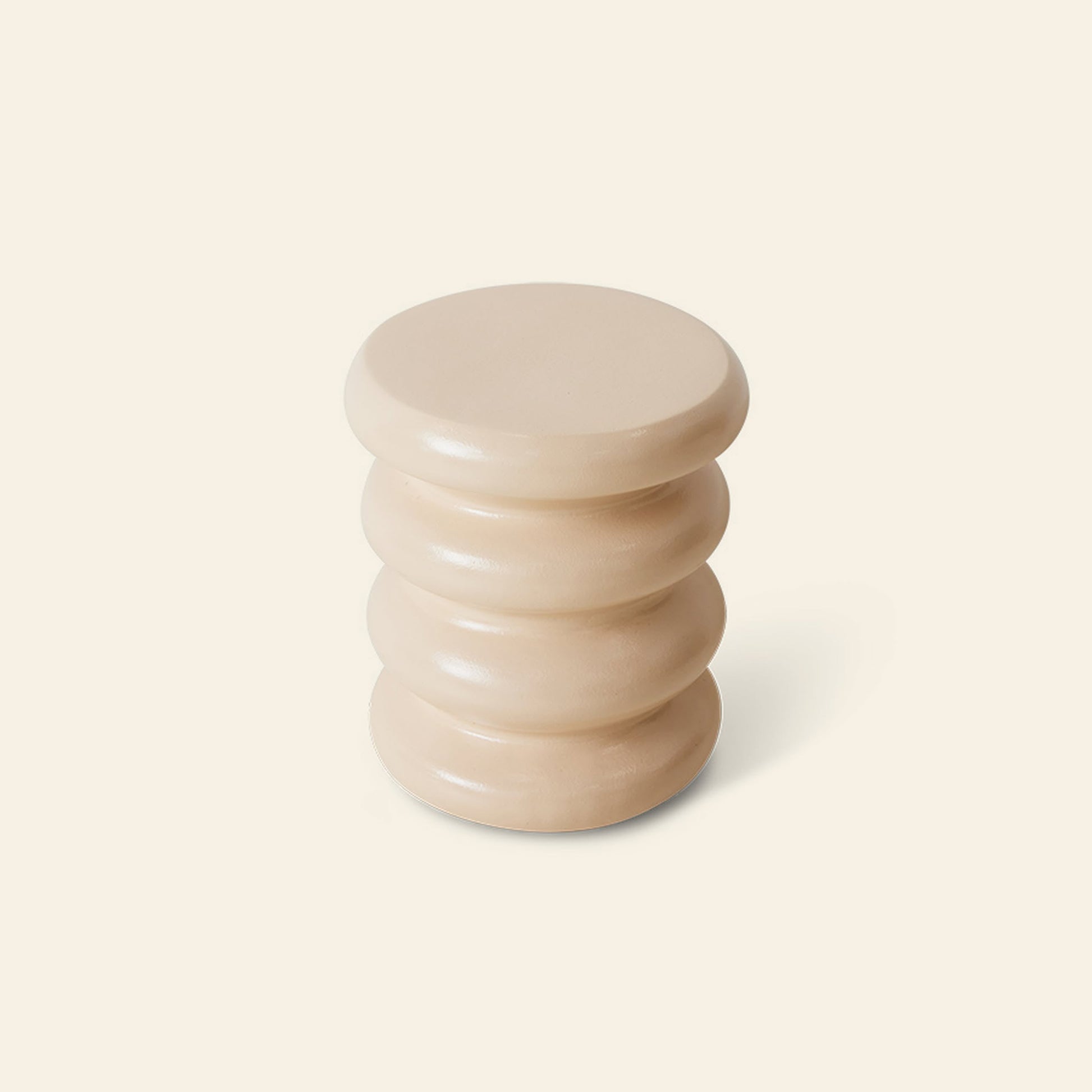 The HKLIVING Allure Side Table by HKLIVING is a beige, cylindrical table with modern elegance, three stacked ring-like sections, and a distinctive ribbed design, shown on a plain light background.