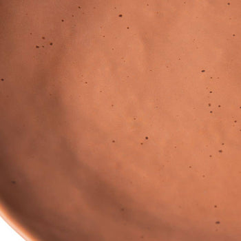 Close-up of the terracotta-colored HKliving Bold & Basic Ceramics Side Plate (Set of 2), showing small black speckles and a smooth, matte ceramic texture.