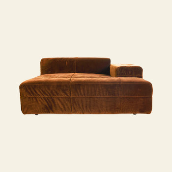 The HKLIVING Brut Sofa, Right Divan by HKLIVING features brown velvet upholstery, a wide seat, low backrest, and a right-side armrest, shown against a plain light background.