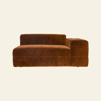 The HKLIVING Brut Sofa, Right by HKLIVING is a modern, armless Brutalist sofa with brown velvet upholstery, a low backrest, and a wide right-side chaise lounge—perfect for cozy seating against a plain light background.