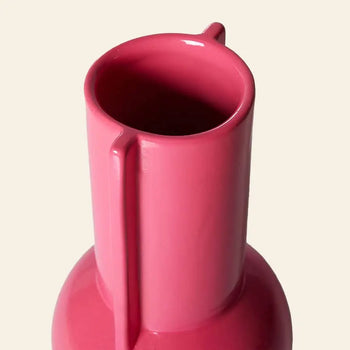 A close-up of the HKLIVING Ceramic Vase Hot Pink, featuring a glossy finish, narrow neck, pouring spout, and vertical handle, displayed against a plain light beige background.