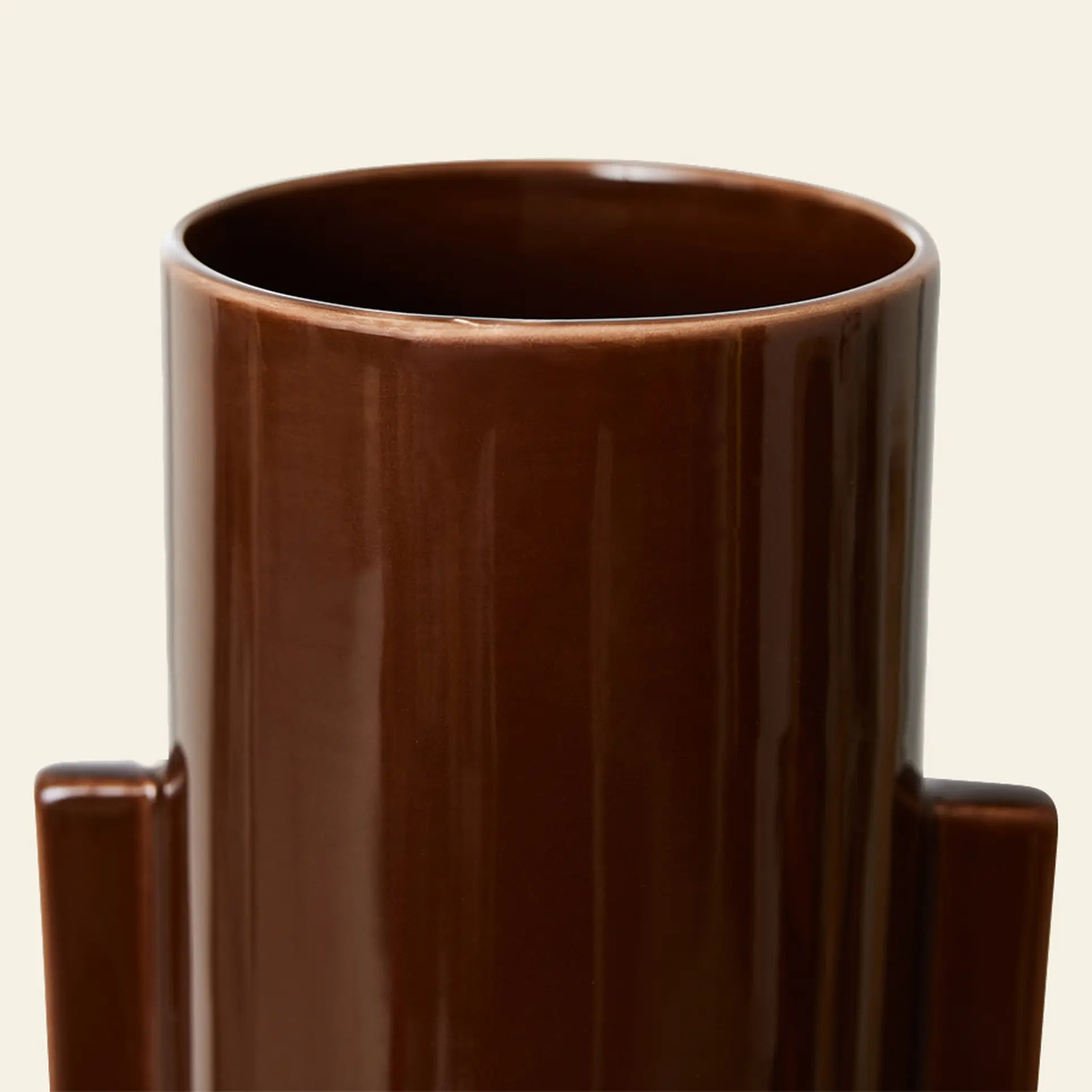 A close-up of the HKLIVING Ceramic Vase L by HKLIVING—a glossy, large brown cylindrical ceramic vase with two rectangular side handles, set against a light neutral background.
