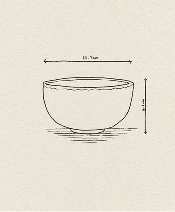 Line drawing of the HKLIVING Chef Ceramics: Bowl by HKLIVING, measuring 10.7 cm wide and 6.1 cm tall, with a slightly wavy rim, small base, and horizontal arrows showing its dimensions.