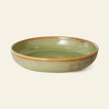 The HKLIVING Chef Ceramics: Deep Plate M is a hand-glazed ceramic bowl featuring a glossy olive green interior and a light brown rim, shown on a plain, light background.
