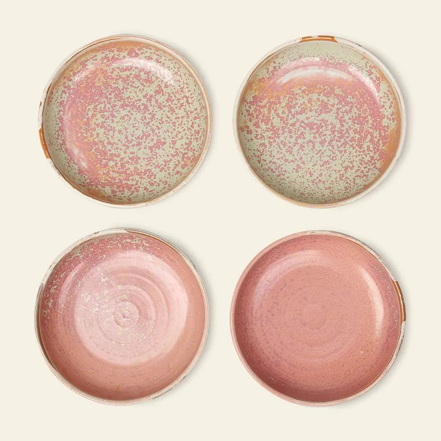 Four HKLIVING Chef Ceramics: Deep Plate M by HKLIVING, in pink and cream with a speckled hand-glazed finish, are arranged in a square on a light background, highlighting their unique textured ceramic surfaces.