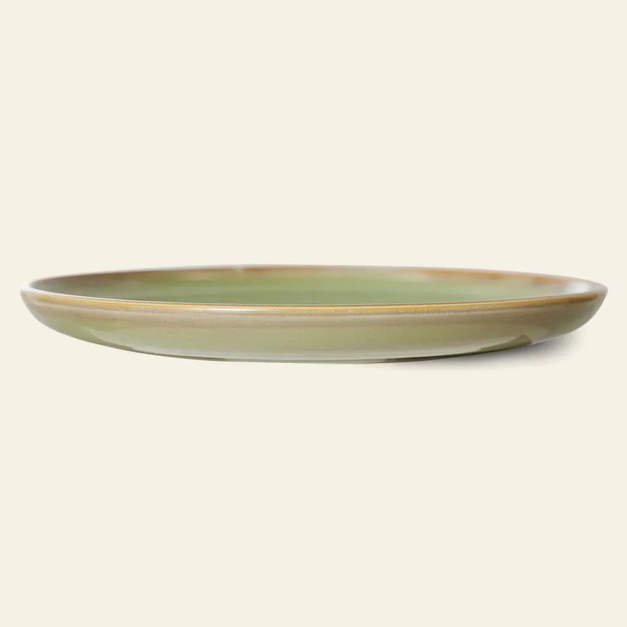 The HKLIVING Chef Ceramics: Dinner Plate is round and shallow, featuring a glossy green artisanal glaze with brown edges, displayed against a plain beige background.