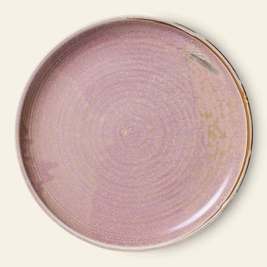 The HKLIVING Chef Ceramics: Dinner Plate features a rustic pink glaze with golden speckles, unique imperfections, and an uneven edge—adding artisanal charm to any table setting.