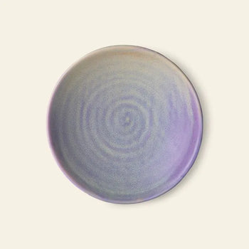 The HKLIVING Chef Ceramics: Flat Bowl is a round ceramic plate with a smooth matte finish, featuring subtle concentric circles and a gradient of soft purple and blue, evoking elegant hotel porcelain against a plain light background.
