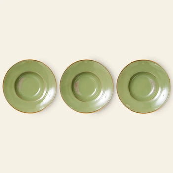 Three HKLIVING Chef Ceramics: Pasta Plates are evenly spaced in a row against a beige background, showcasing the handcrafted green ceramic design with brown rims, perfect for serving pasta or displaying chef ceramics.