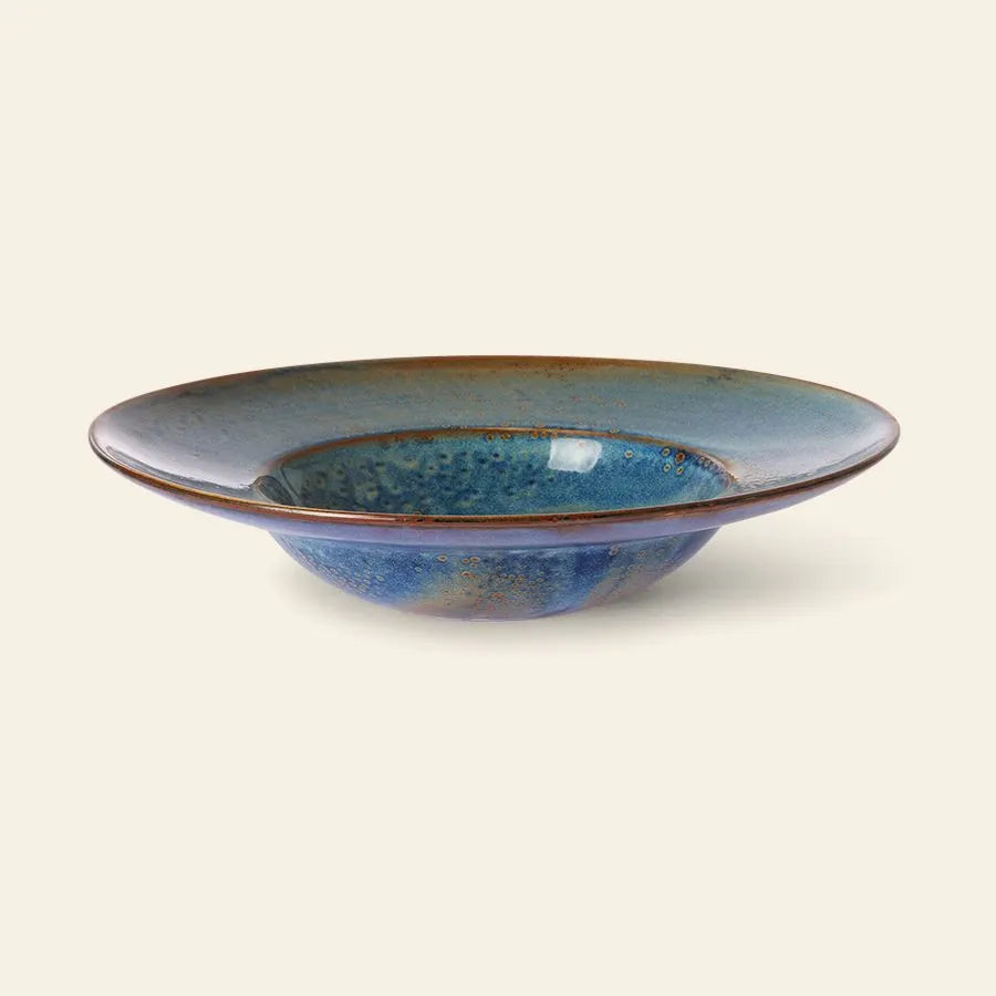 The HKLIVING Chef Ceramics Pasta Plate is a handcrafted, shallow round plate with a wide rim, glazed in blue and brown tones, shown against a plain light background.