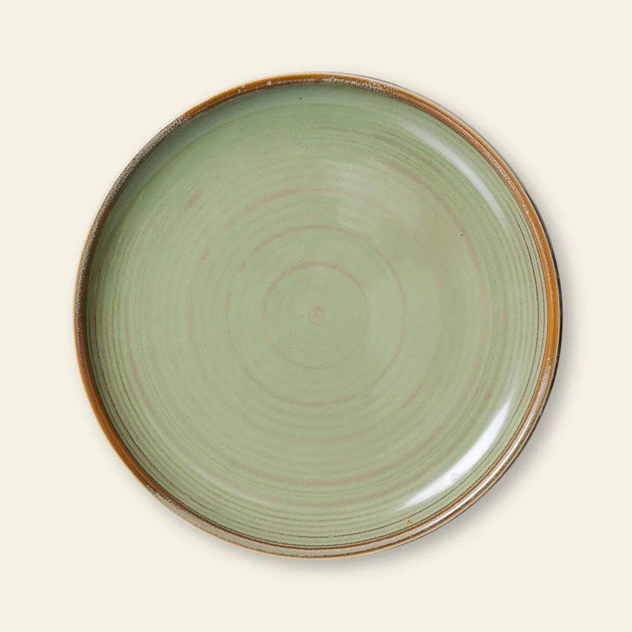 The HKLIVING Chef Ceramics Side Plate is a round, hand-glazed ceramic plate with a light green center, brown rim, and subtle circular patterns, displayed against a plain, light background.