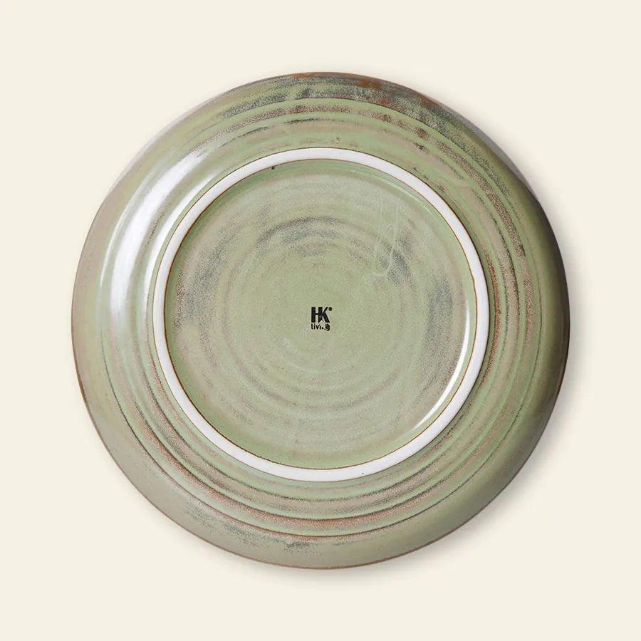 The HKLIVING Chef Ceramics: Side Plate is round with a smooth, pale green hand-glazed finish and subtle circular ridges. Viewed from the base, a small black HKLIVING logo with text is at the center—ideal for chef ceramics collections.