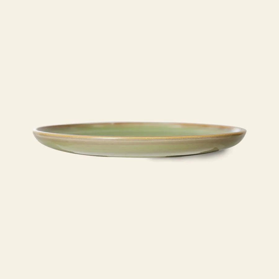 The HKLIVING Chef Ceramics: Side Plate features a shallow, round design with a glossy green hand-glazed finish and subtle brown rim, displayed against a plain light beige background.