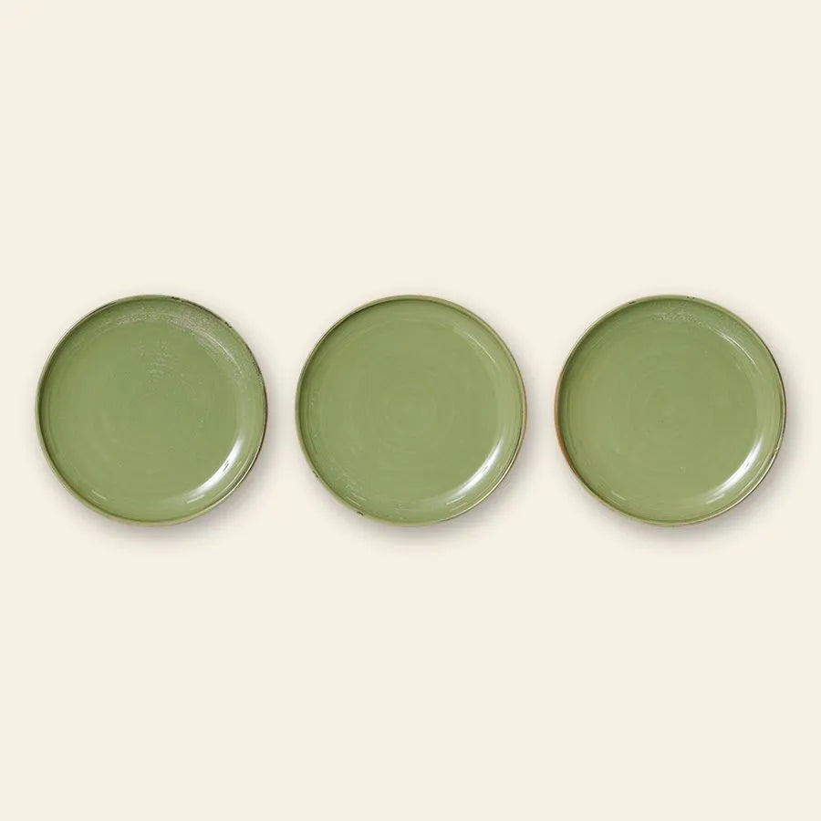 Three HKLIVING Chef Ceramics side plates, round and hand-glazed in green, are arranged in a horizontal line on a light beige background.