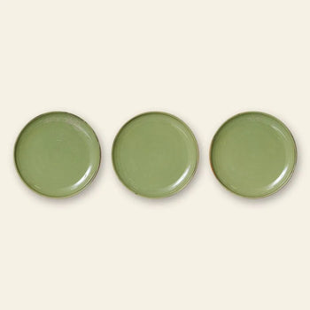 Three HKLIVING Chef Ceramics side plates, round and hand-glazed in green, are arranged in a horizontal line on a light beige background.
