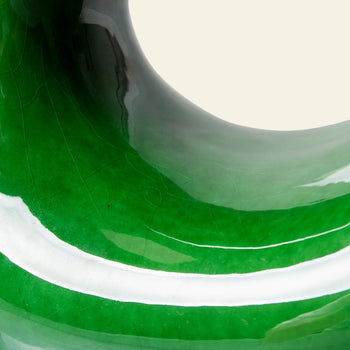 Close-up of HKLIVING HK Objects: Ceramic Sculpture—glossy green ceramic with curved lines and reflections, creating a modern abstract pattern. Ideal as stylish green home decor by HKLIVING for contemporary interiors.