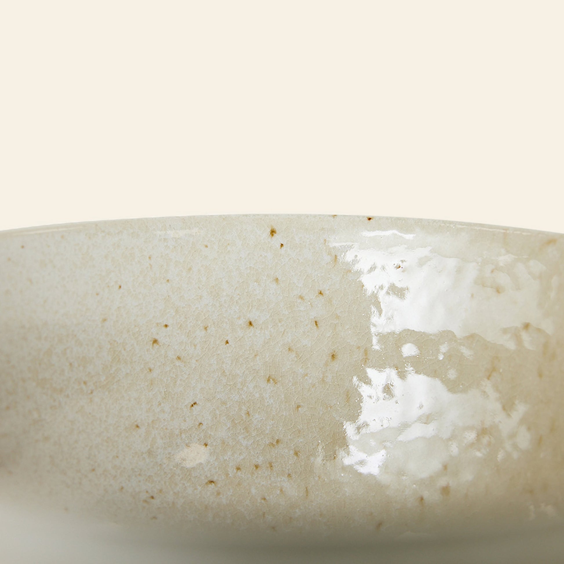 Close-up of an HKLIVING Kyoto Ceramics Japanese Noodle Bowl, part of a set of 4, featuring a glossy speckled beige glaze and hand-finished details inspired by traditional Kyoto ceramics. The bowl is shown partially against a plain background.