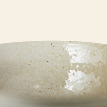 Close-up of an HKLIVING Kyoto Ceramics Japanese Noodle Bowl, part of a set of 4, featuring a glossy speckled beige glaze and hand-finished details inspired by traditional Kyoto ceramics. The bowl is shown partially against a plain background.
