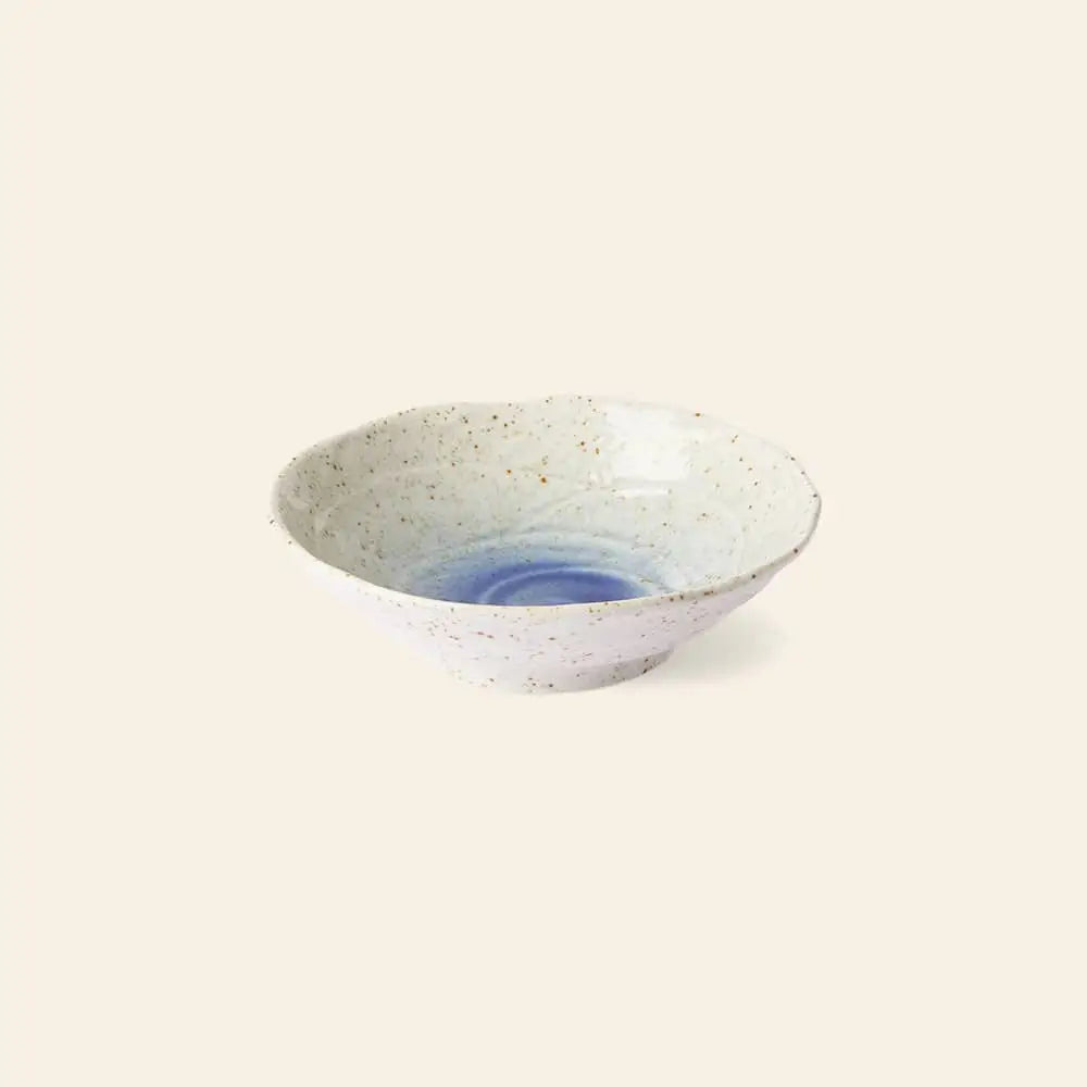 The HKLIVING Kyoto Ceramics Japanese Shallow Bowls, Set of 4, feature a speckled white exterior and glossy blue center, inspired by Japanese design and shown against a light beige background.