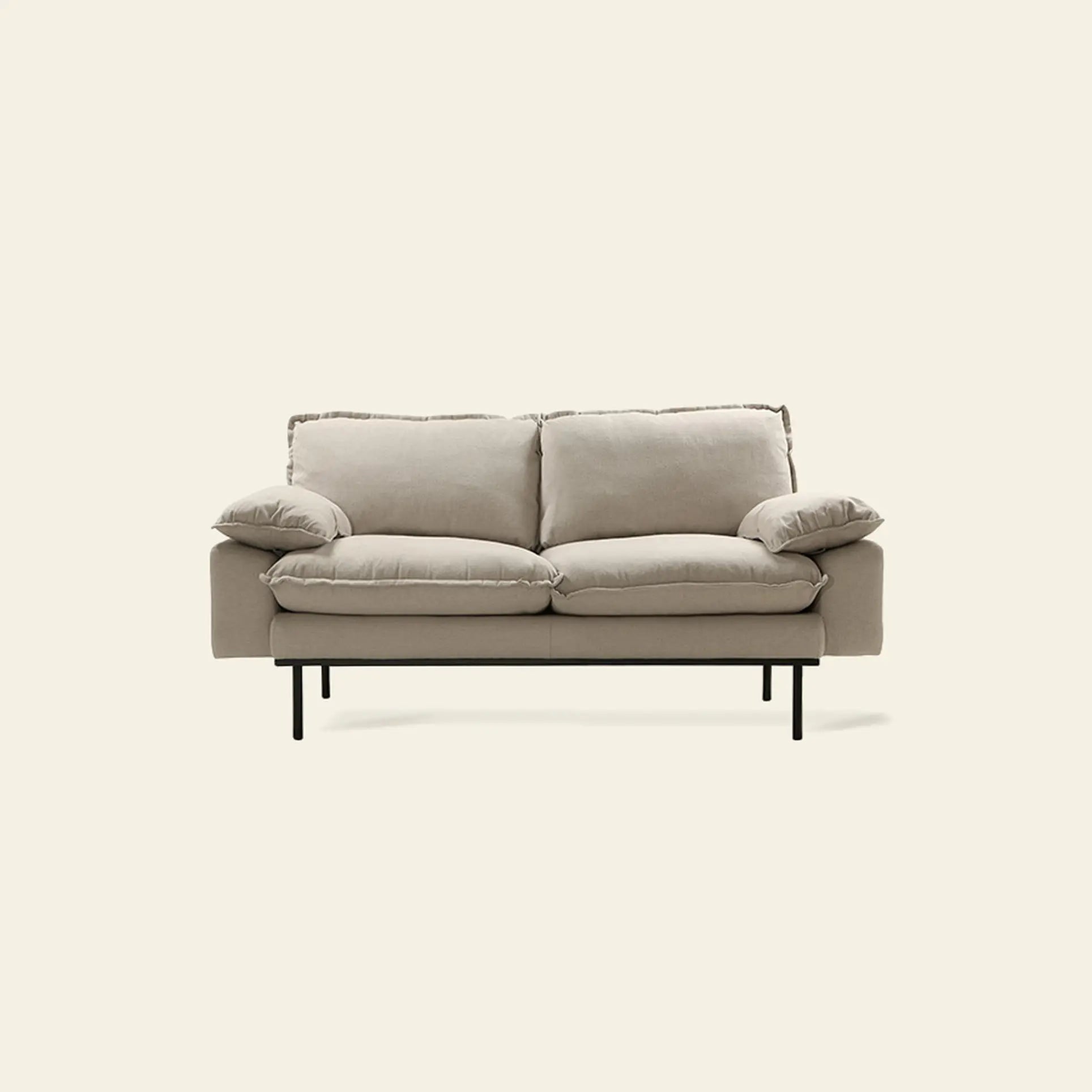 The HKLIVING Retro Sofa, 2-Seats by HKLIVING features plush cushions and slim black metal legs, offering modern vintage style. Shown here against a plain off-white background.