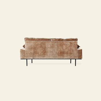 The HKLIVING Retro Sofa, 2-Seats, by HKLIVING, showcases a vintage-inspired brown corduroy design with slim black metal legs and a classic silhouette, viewed from the back against a plain light background.