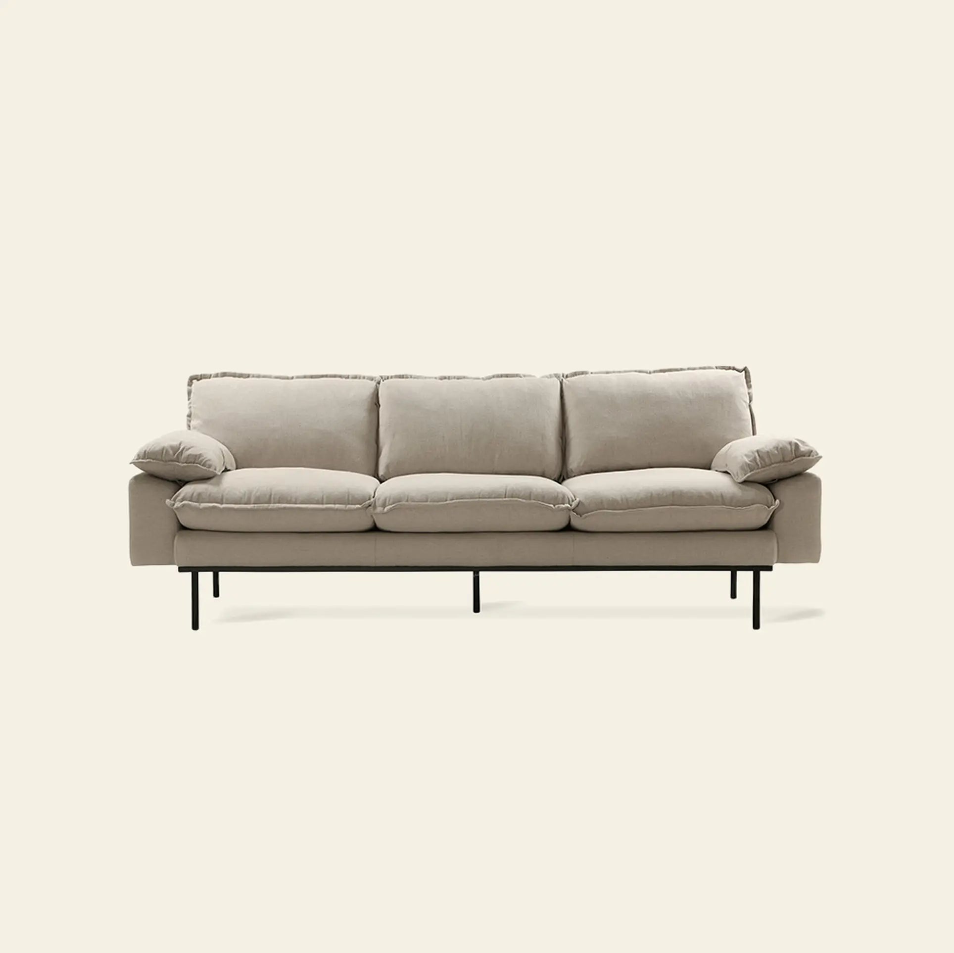 The HKLIVING Retro Sofa, 3-Seats by HKLIVING features a modern beige design with plush cushions and slim black metal legs, set against a plain light background.