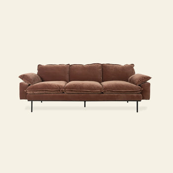 The HKLIVING Retro Sofa, 3-Seats, features brown plush upholstery, deep cushions, low armrests, and slim black metal legs. Displayed against a plain off-white background.