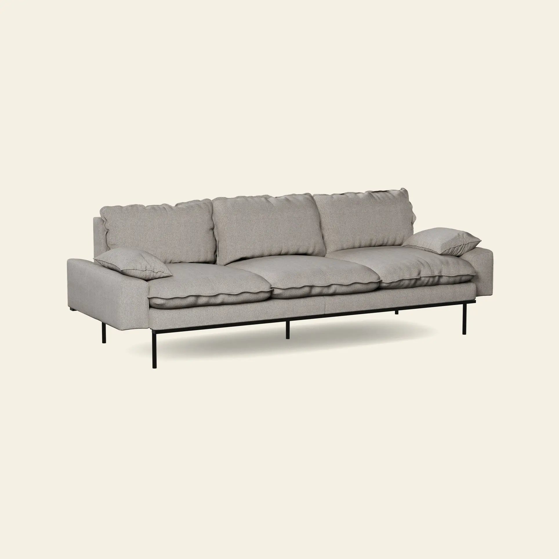 The HKLIVING Retro Sofa, 4-Seats, features a modern light gray design with three seat and back cushions, slim black metal legs, and two matching accent pillows. Shown against a plain off-white background. Brand: HKLIVING.