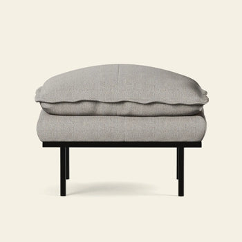 The HKLIVING Retro Sofa Hocker features a plush light gray cushion and a black metal frame, displayed from the front against an off-white background.